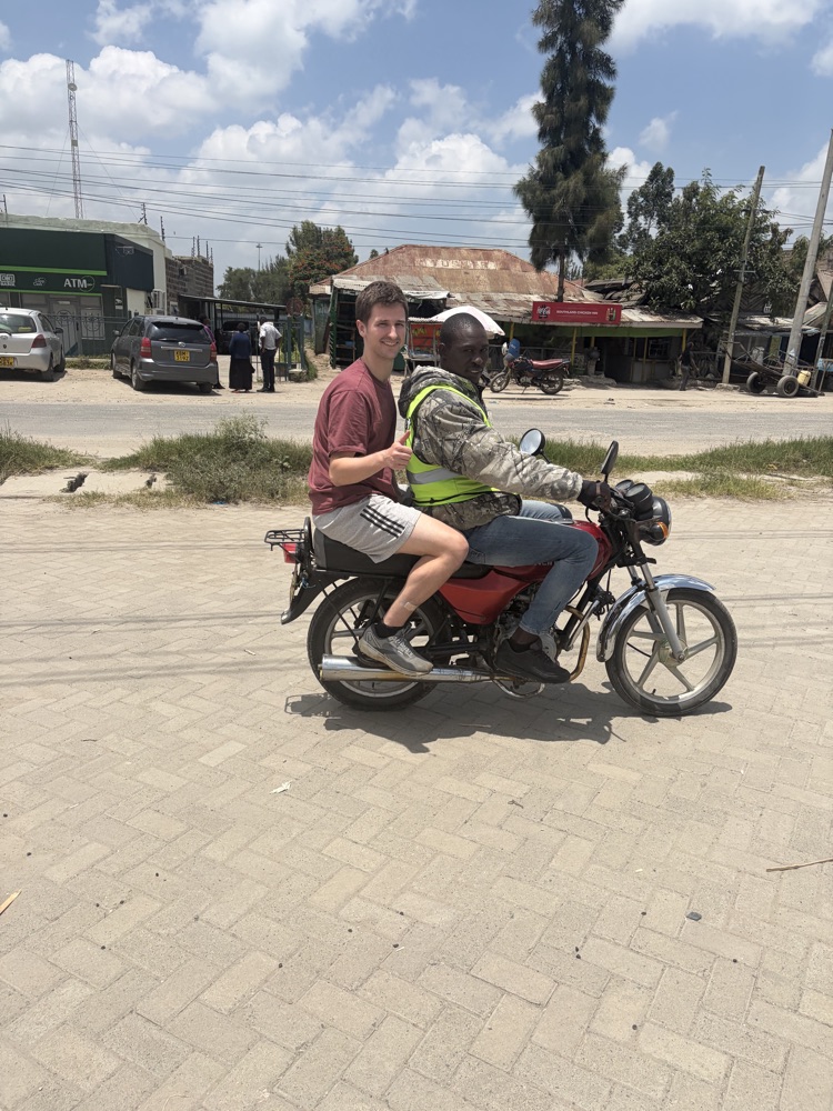 Riding a boda boda during field work near Nairobi